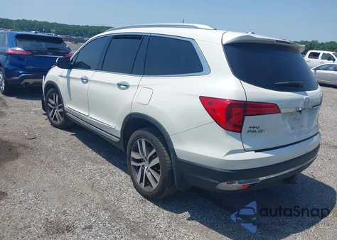 2016 Honda Pilot Touring z USA, uszkodzony, nr VIN 5FNYF6H92GB053298
